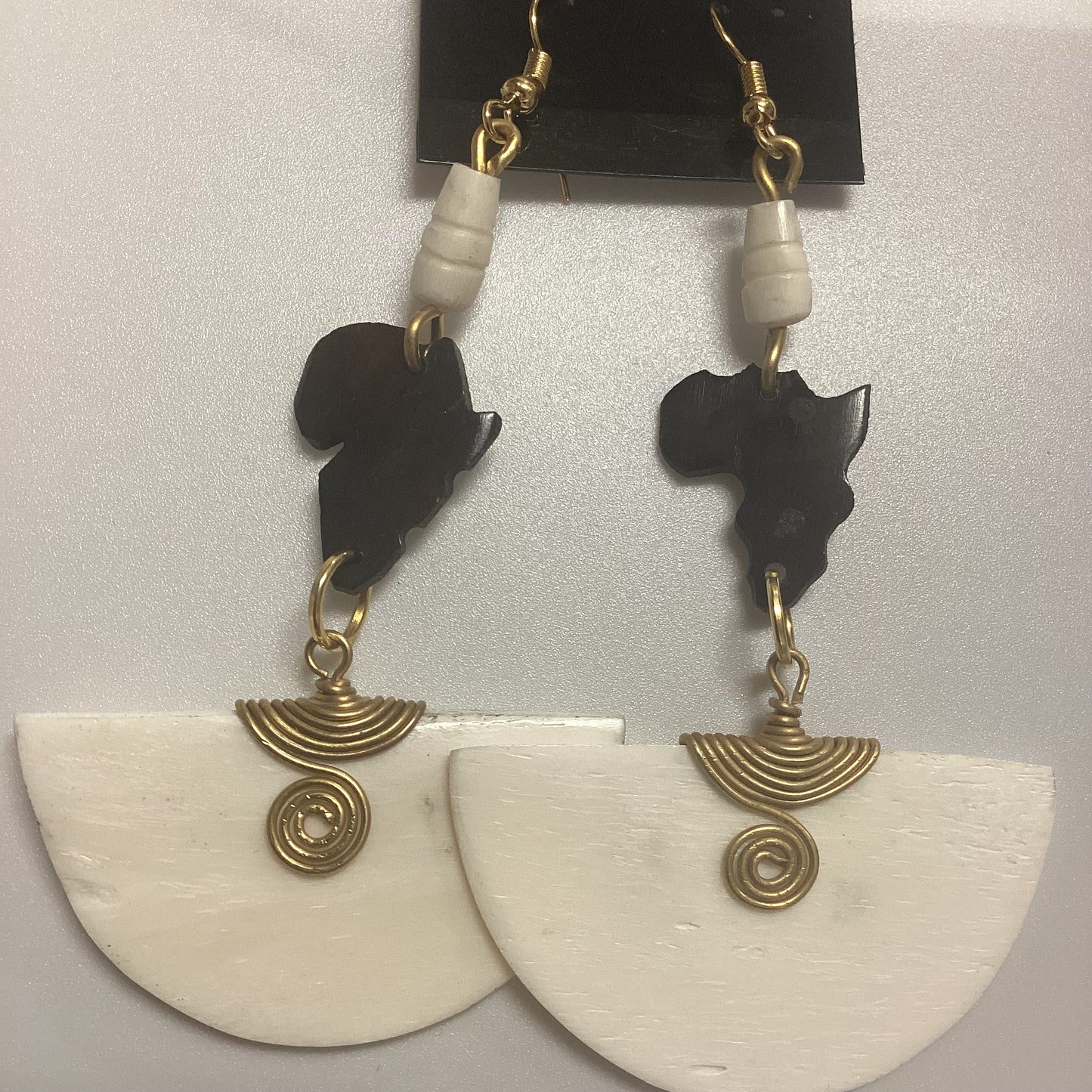 African map Brown half circle bone wrapped in brass earrings.