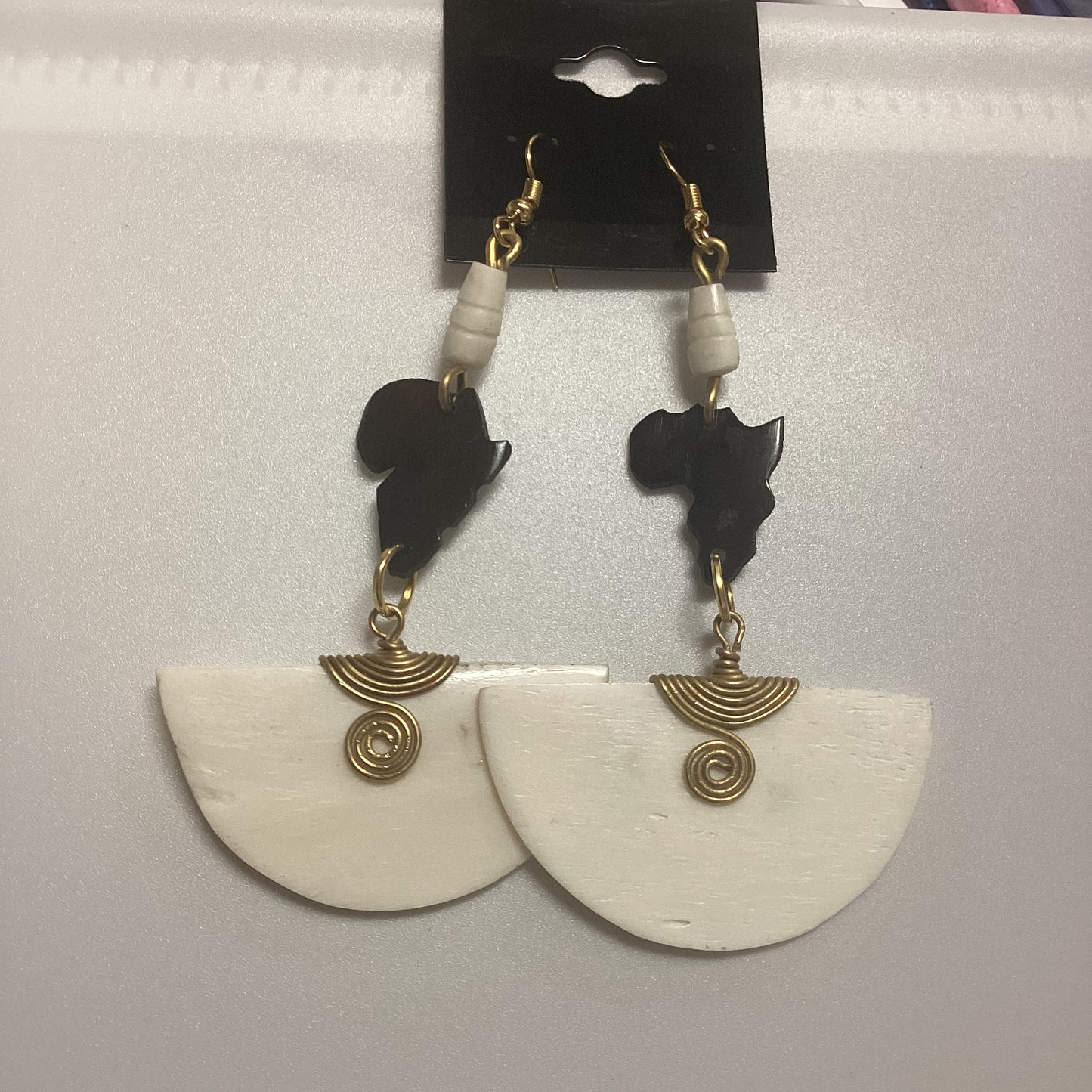African map Brown half circle bone wrapped in brass earrings.