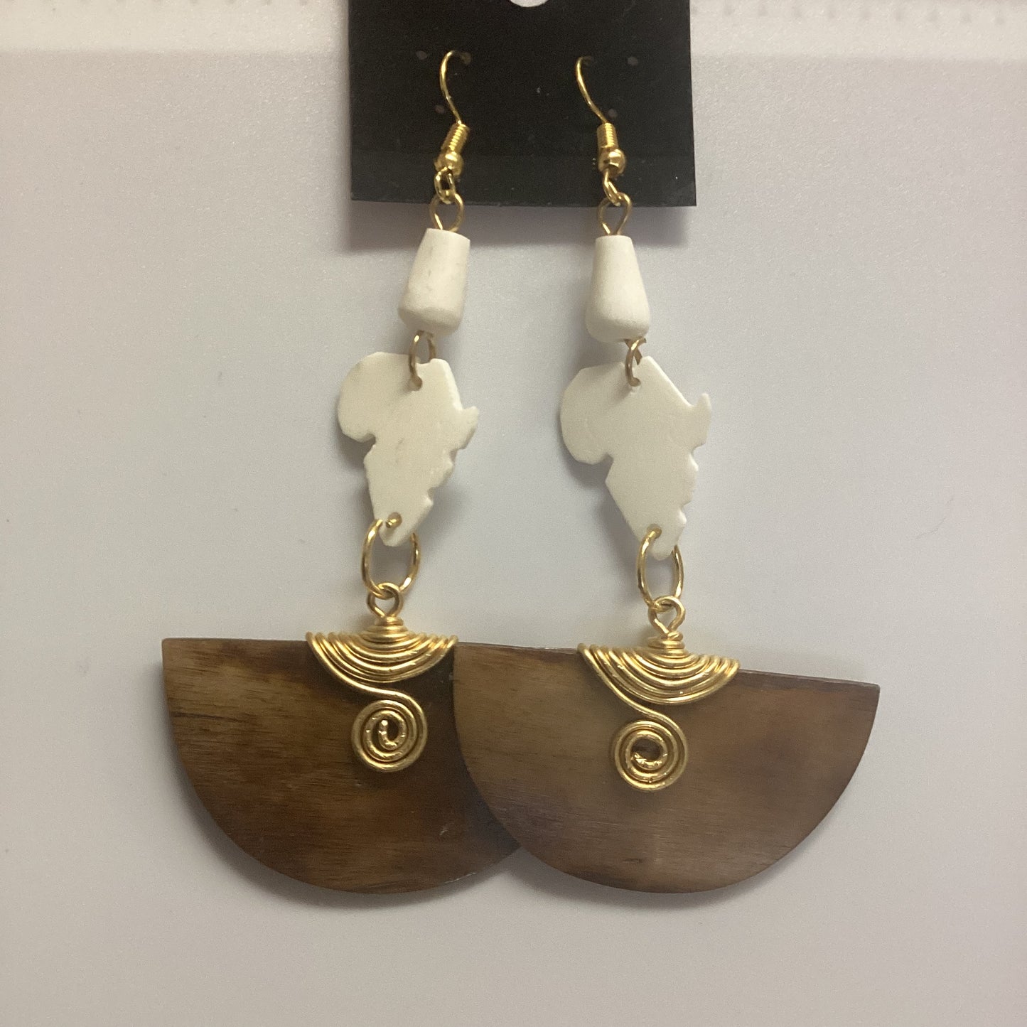 African map Brown half circle bone wrapped in brass earrings.