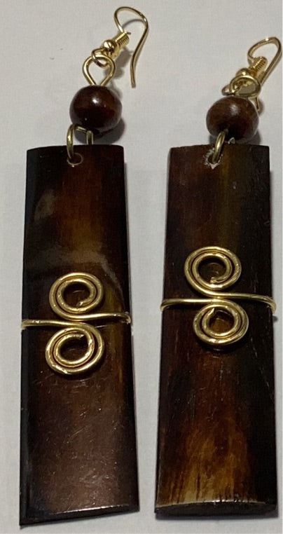 Brown bone wrapped in brass earrings.