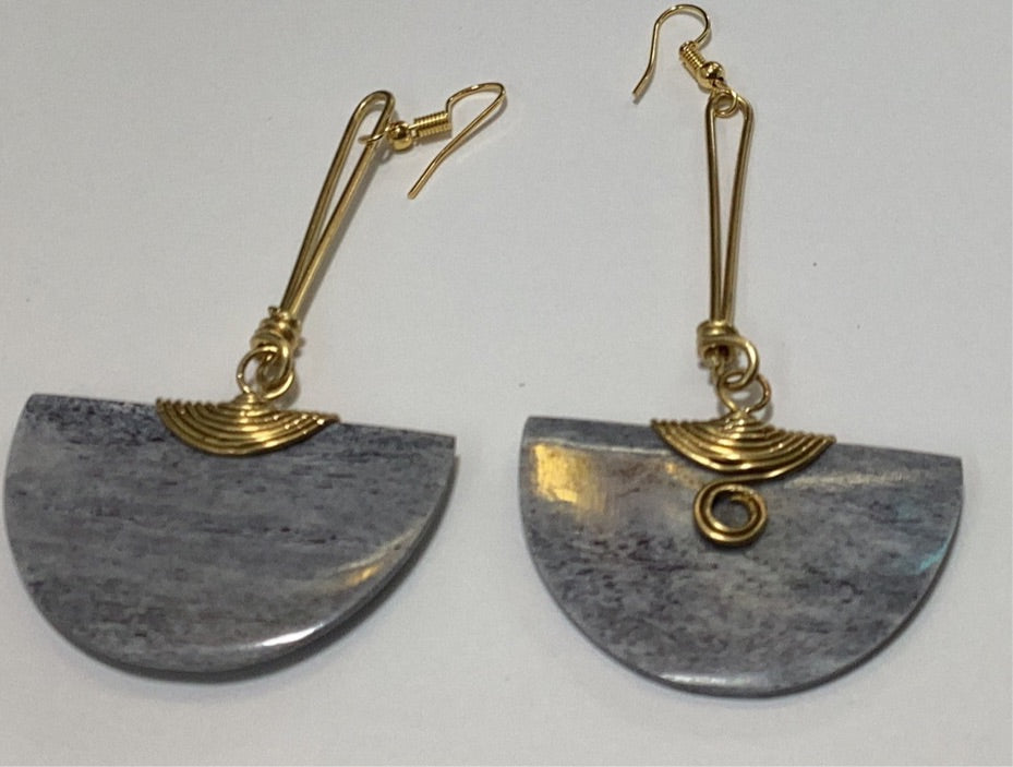 Gray half circle bone wrapped in brass earrings.